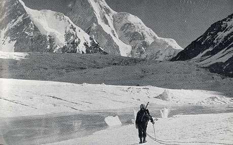 A photo Charlie Houston at the foot of K2